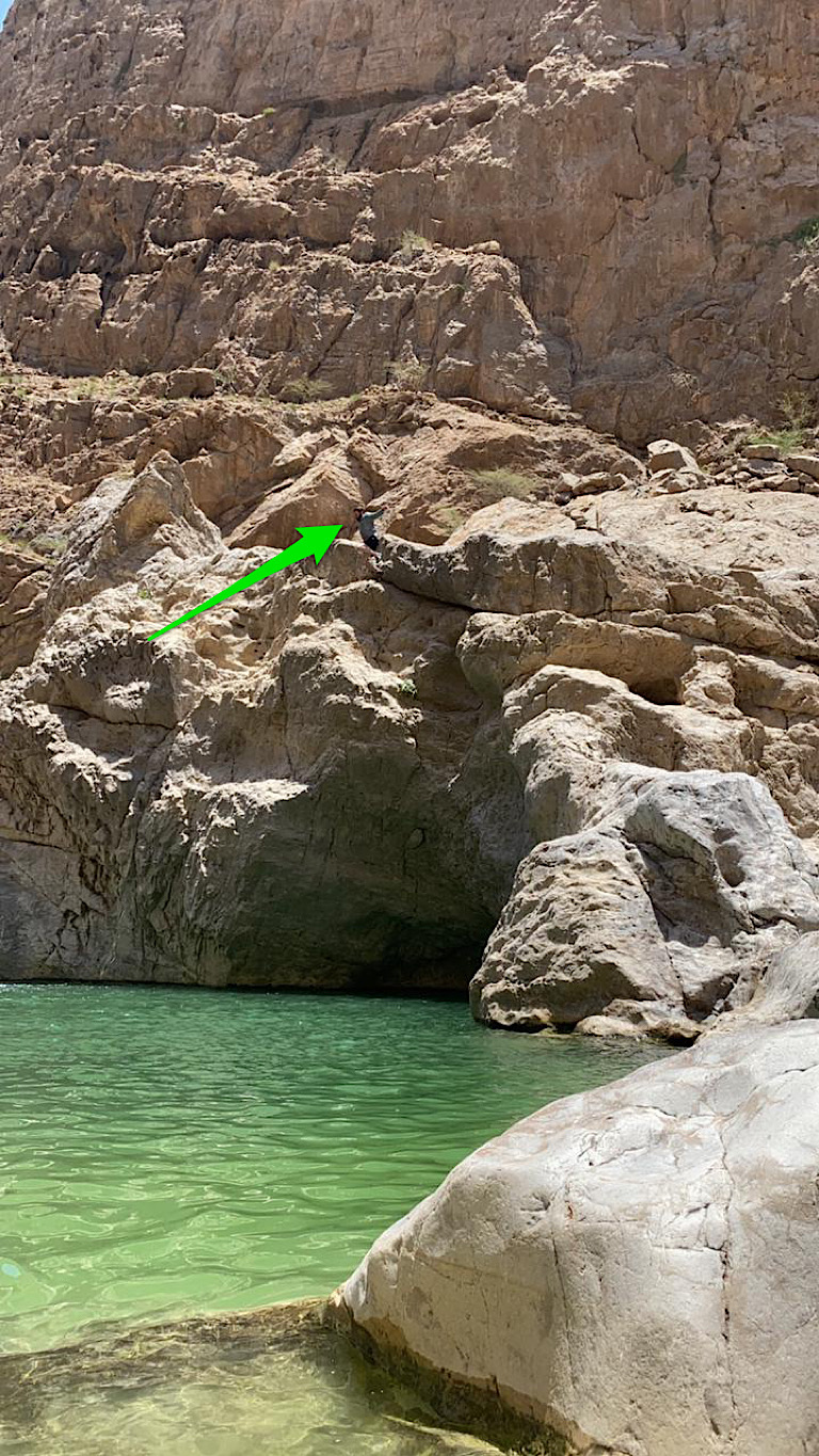 picture of a cliff with a man falling