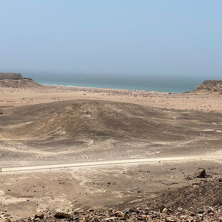 view of ras al jinz beach from resort eco tent trail