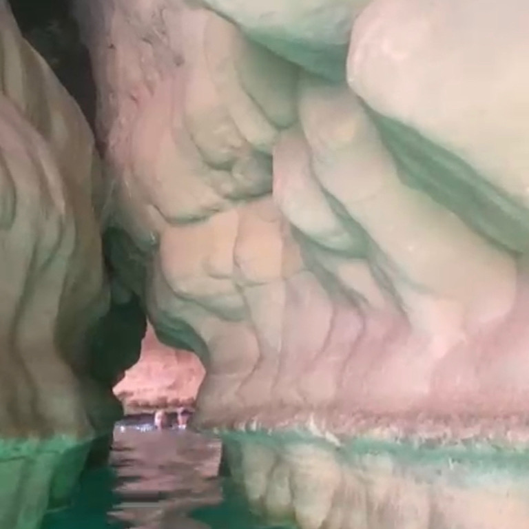 photo looking through a passageway into a the cave at wadi shab